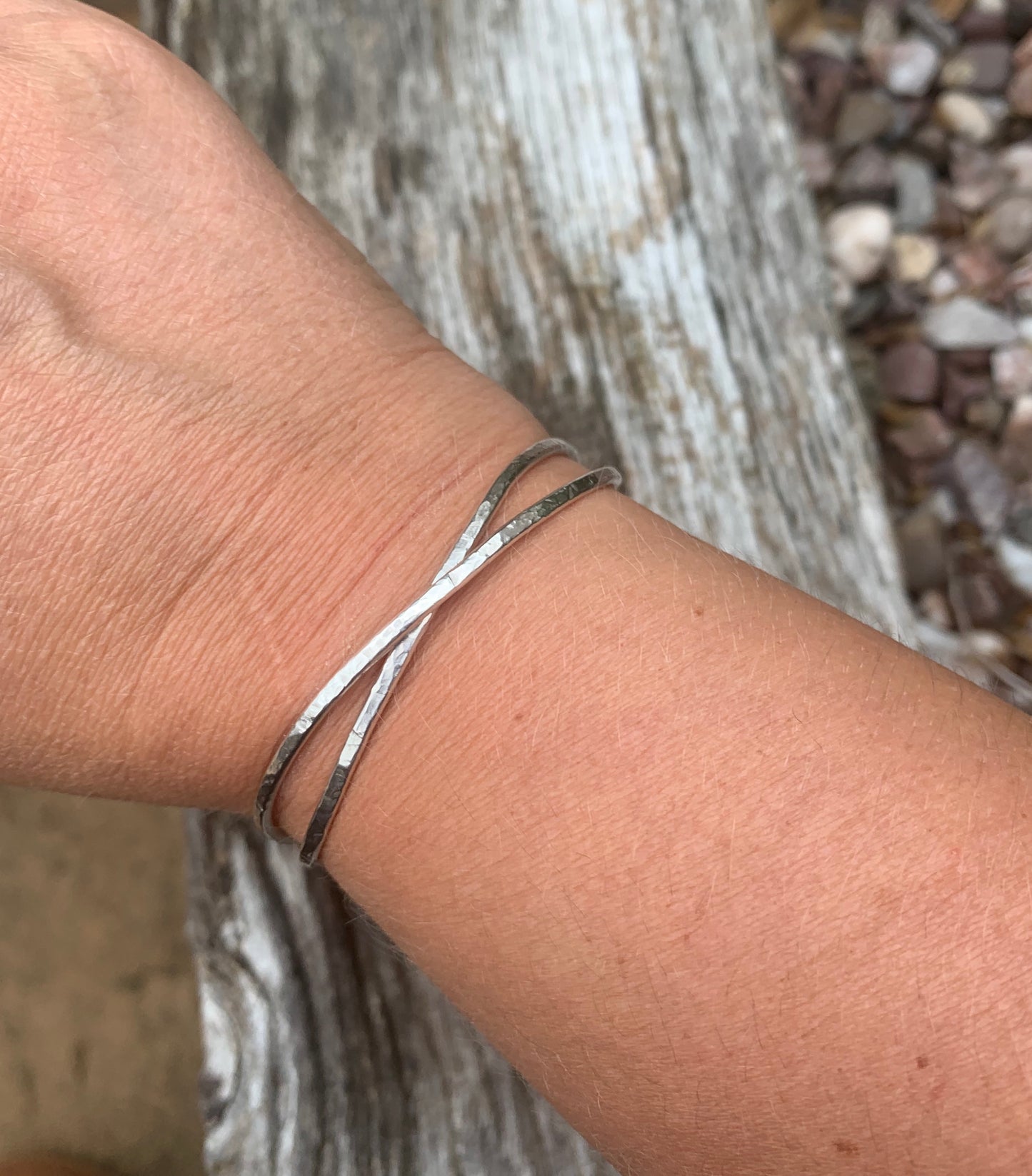 Sterling silver textured crossover bangle