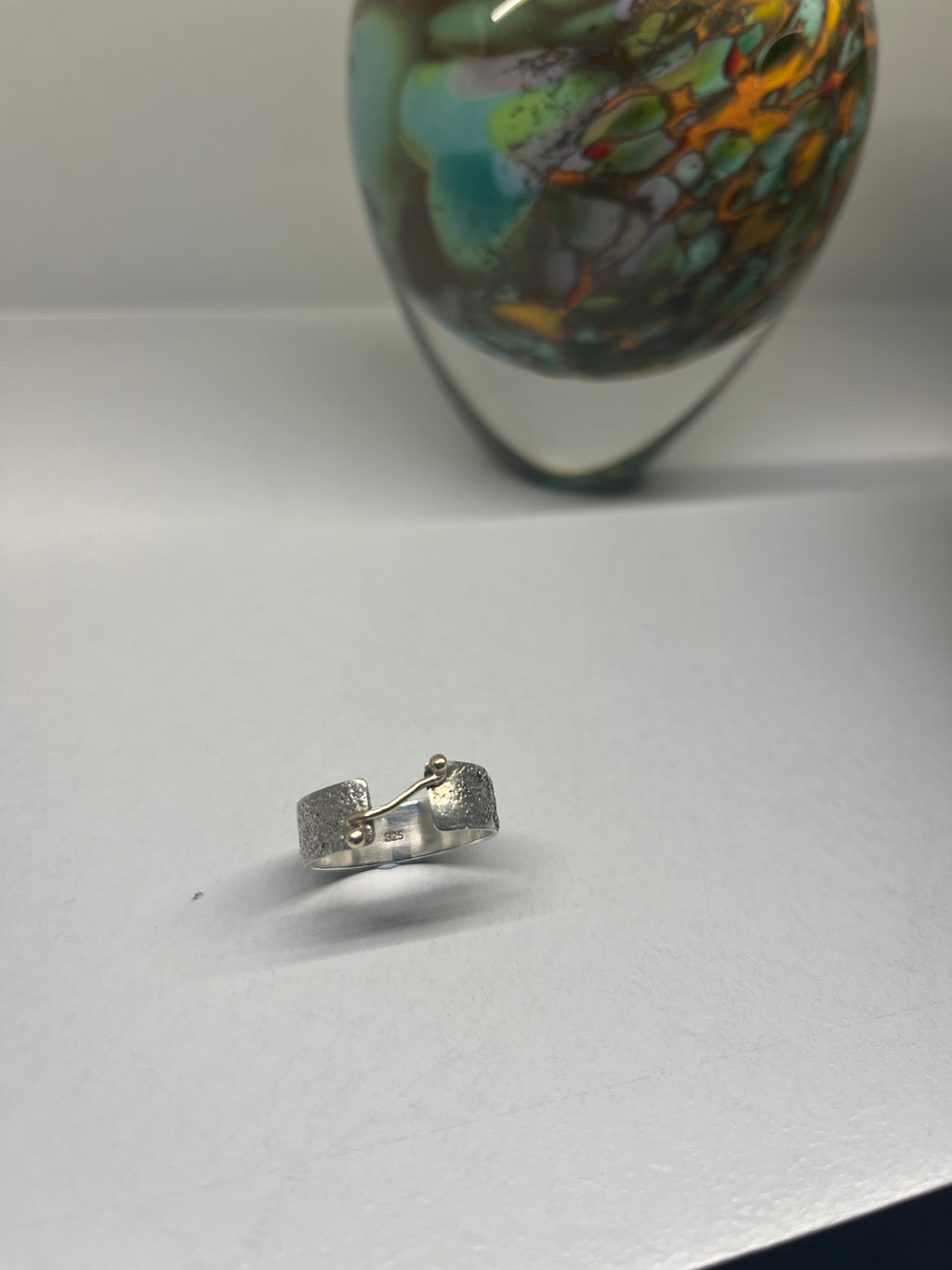 Sterling silver and 9ct gold molten ring