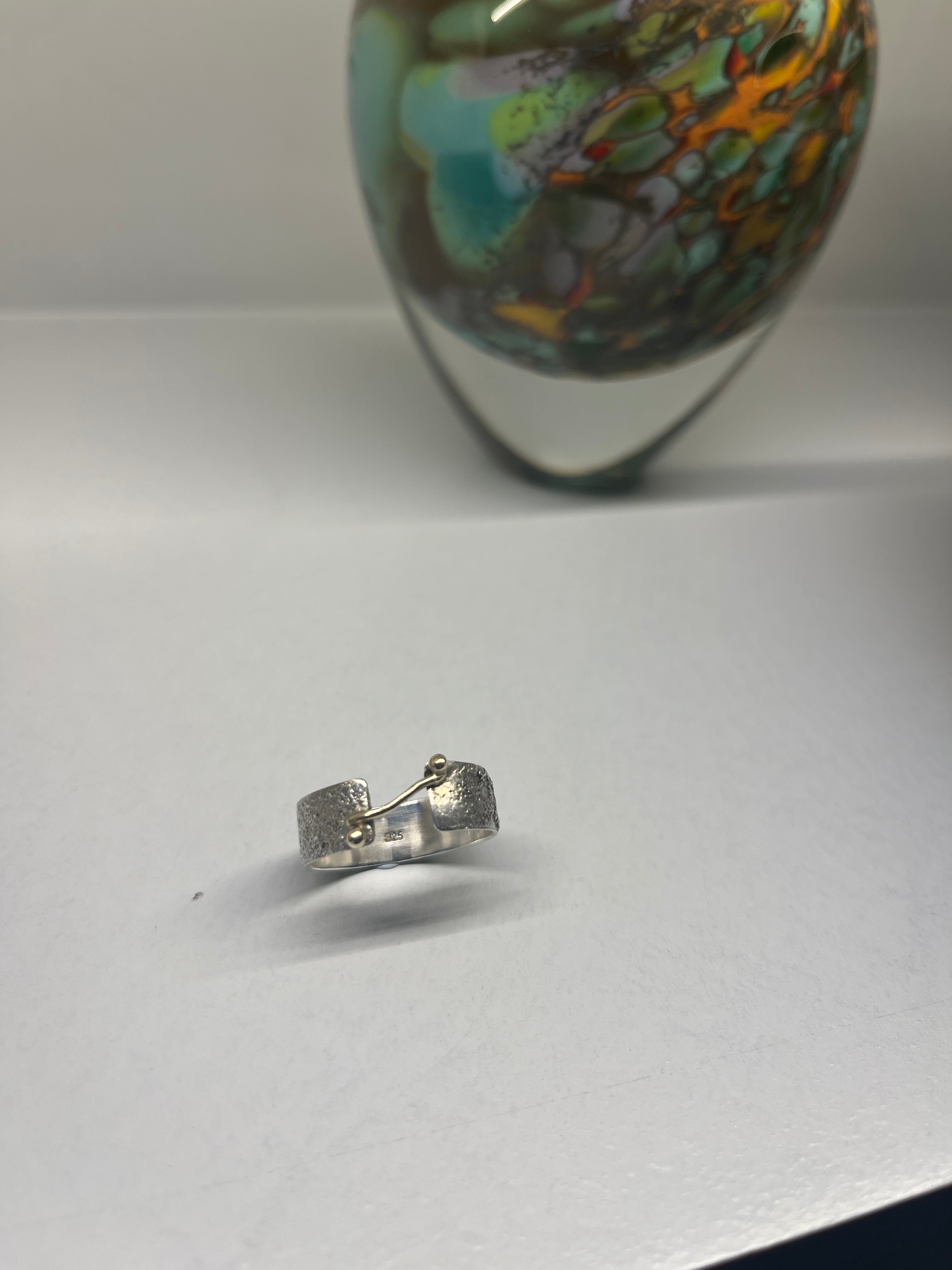 Sterling silver and 9ct gold molten ring