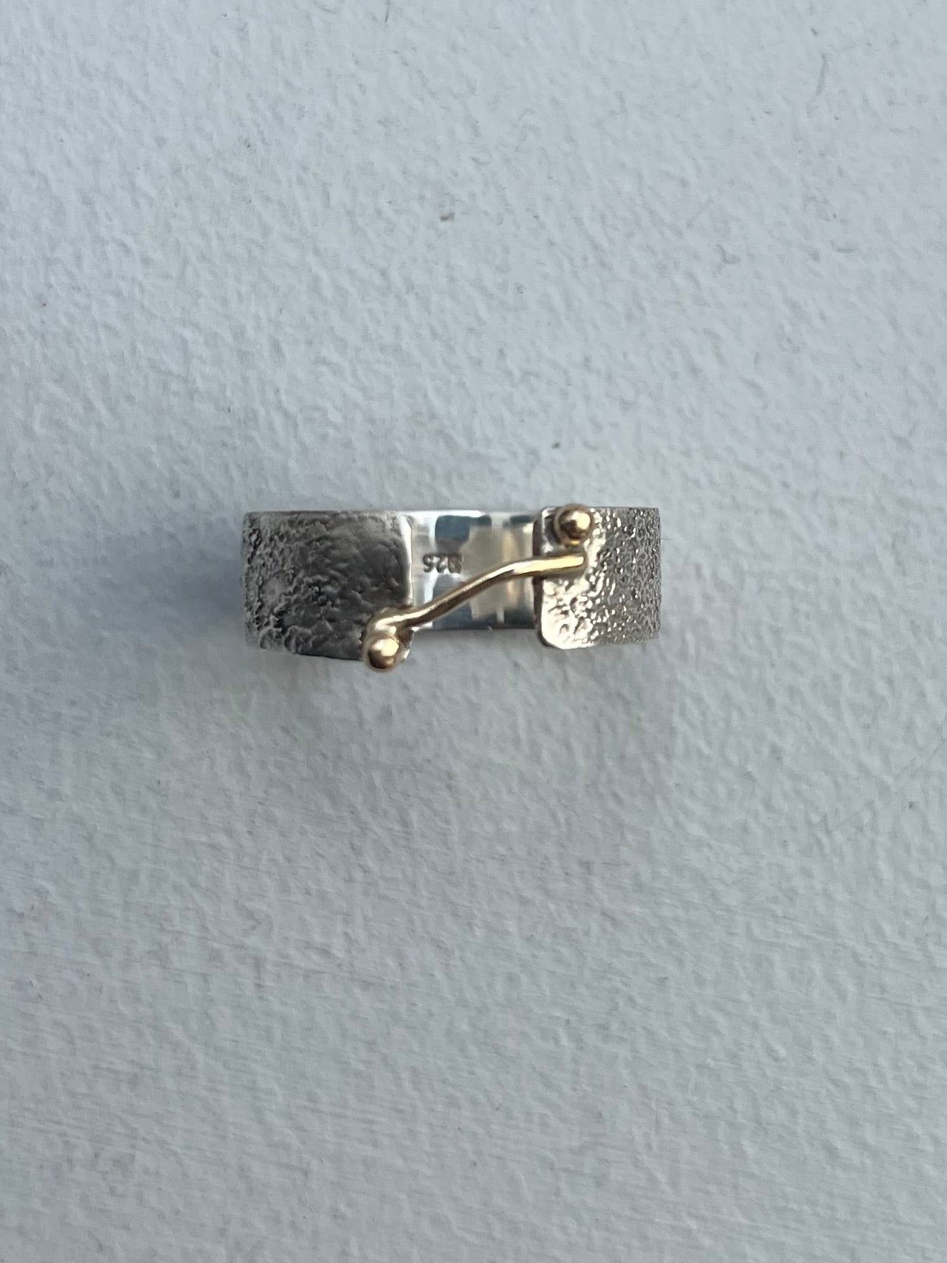 Sterling silver and 9ct gold molten ring