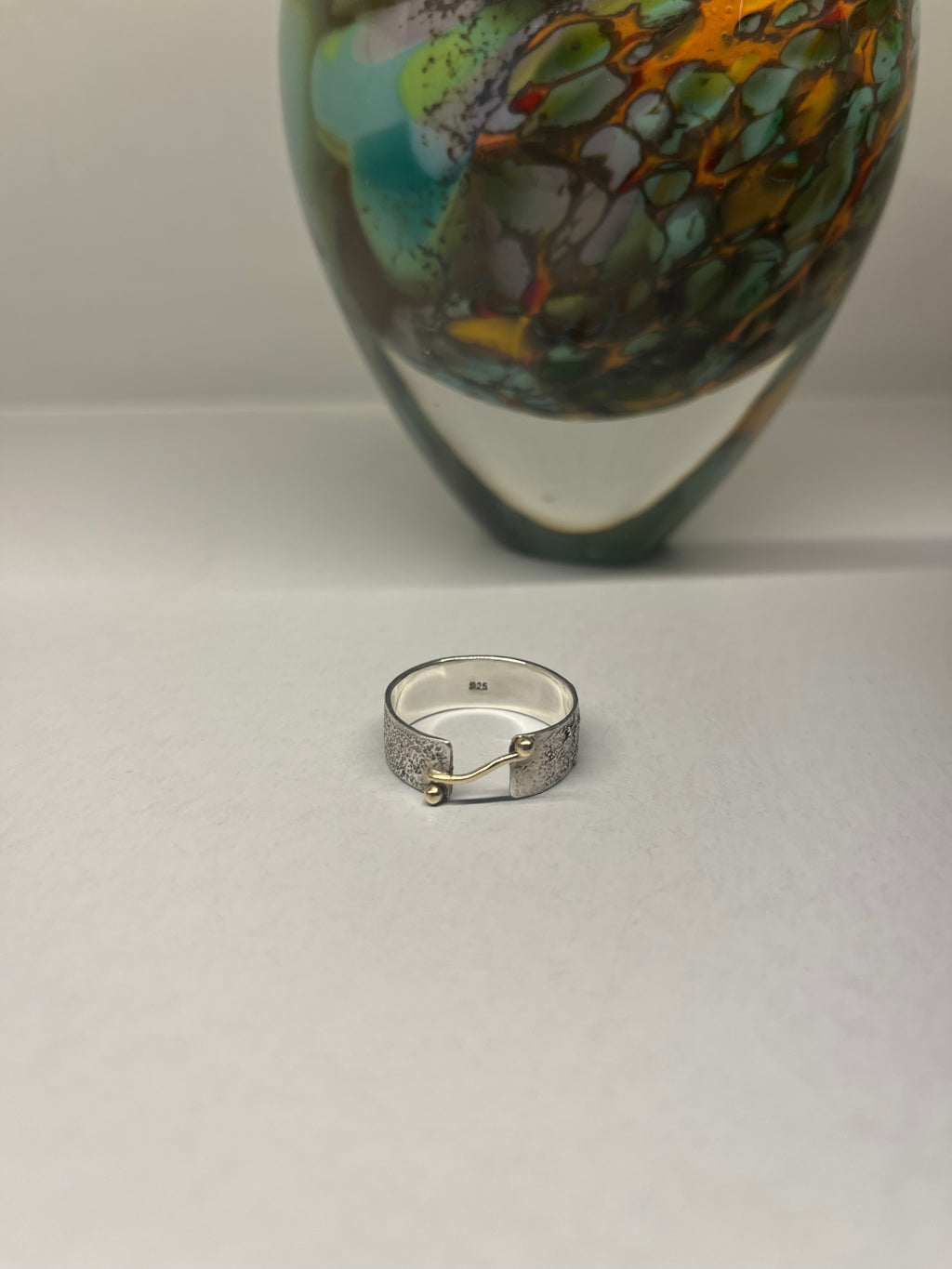Sterling silver and 9ct gold molten ring
