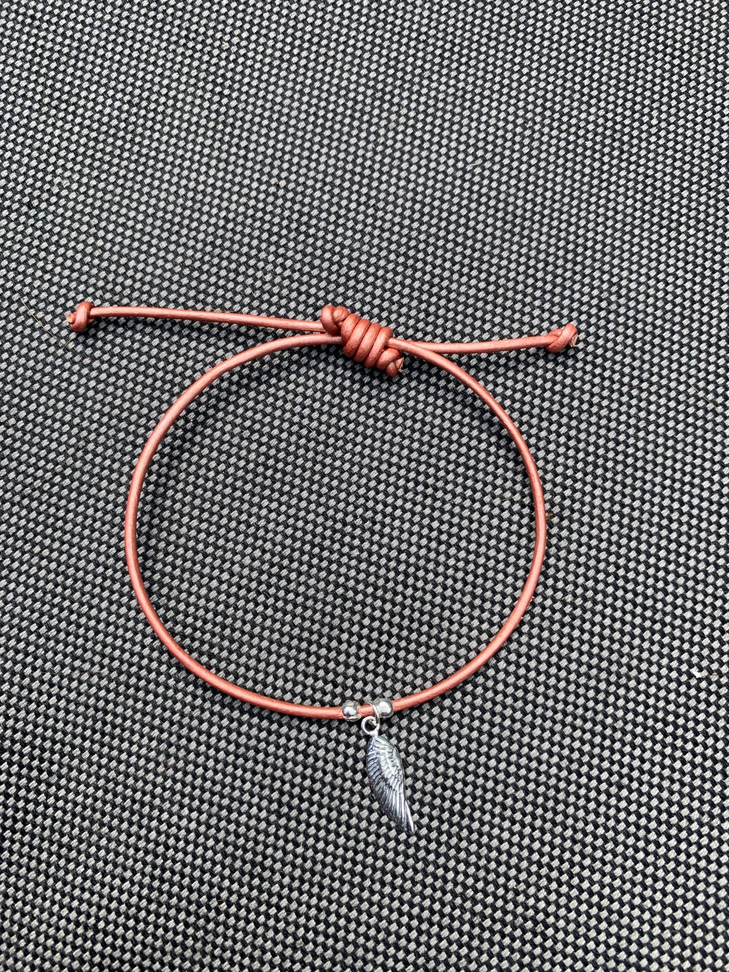 Peach leather with sterling silver charm bracelet